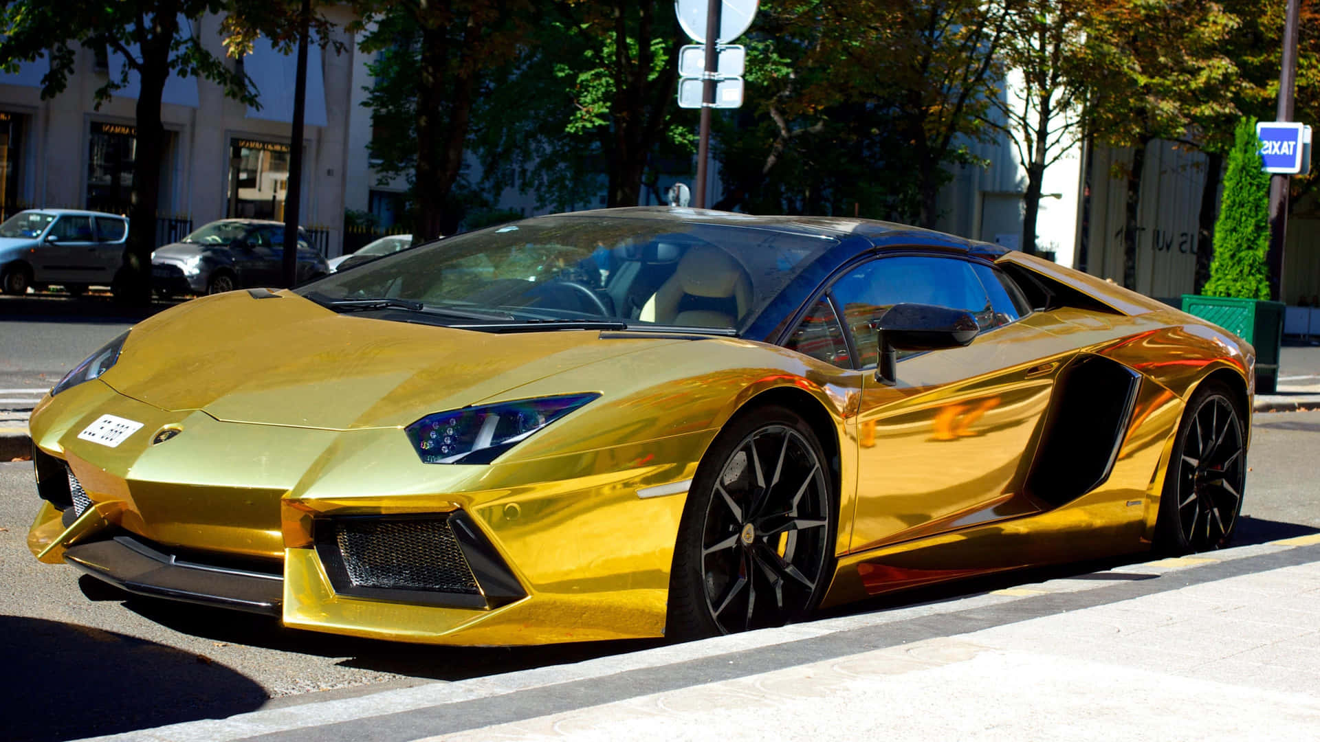 Fancy Gold Lamborghini Spotted On The Streets Wallpaper