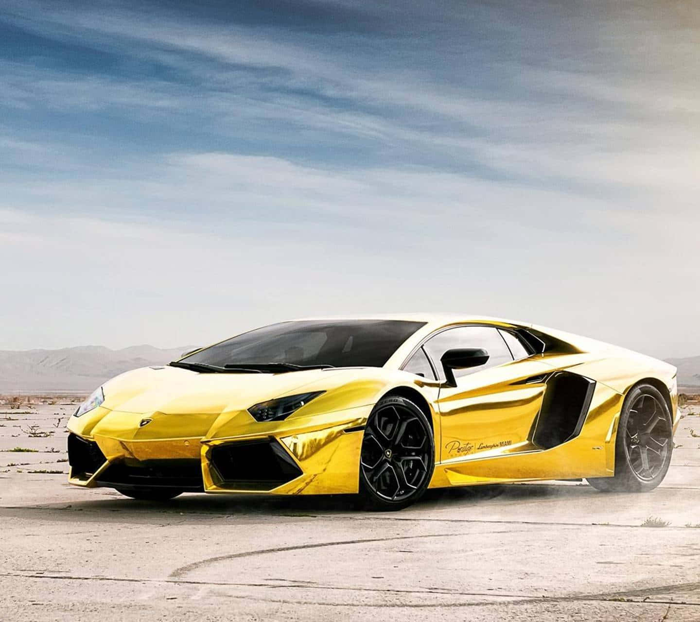 Gold Lamborghini shines on the street Wallpaper