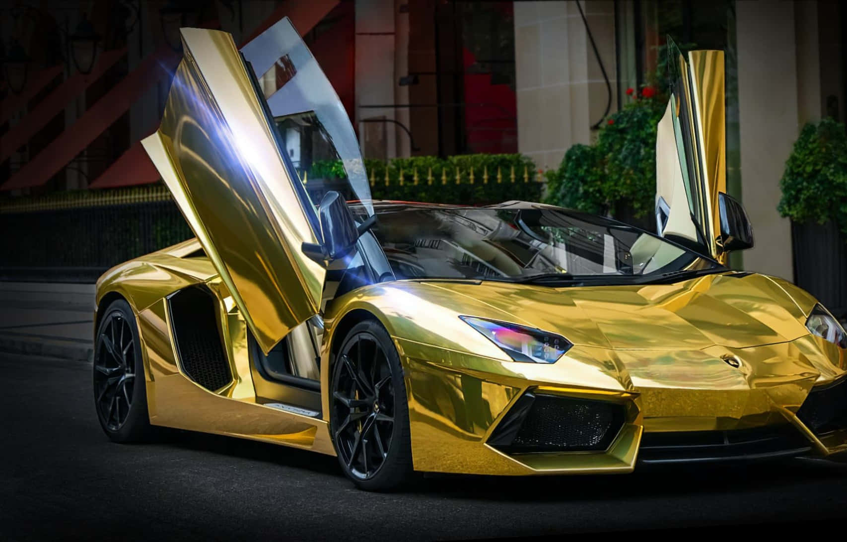 A Gold Sports Car With Its Doors Open