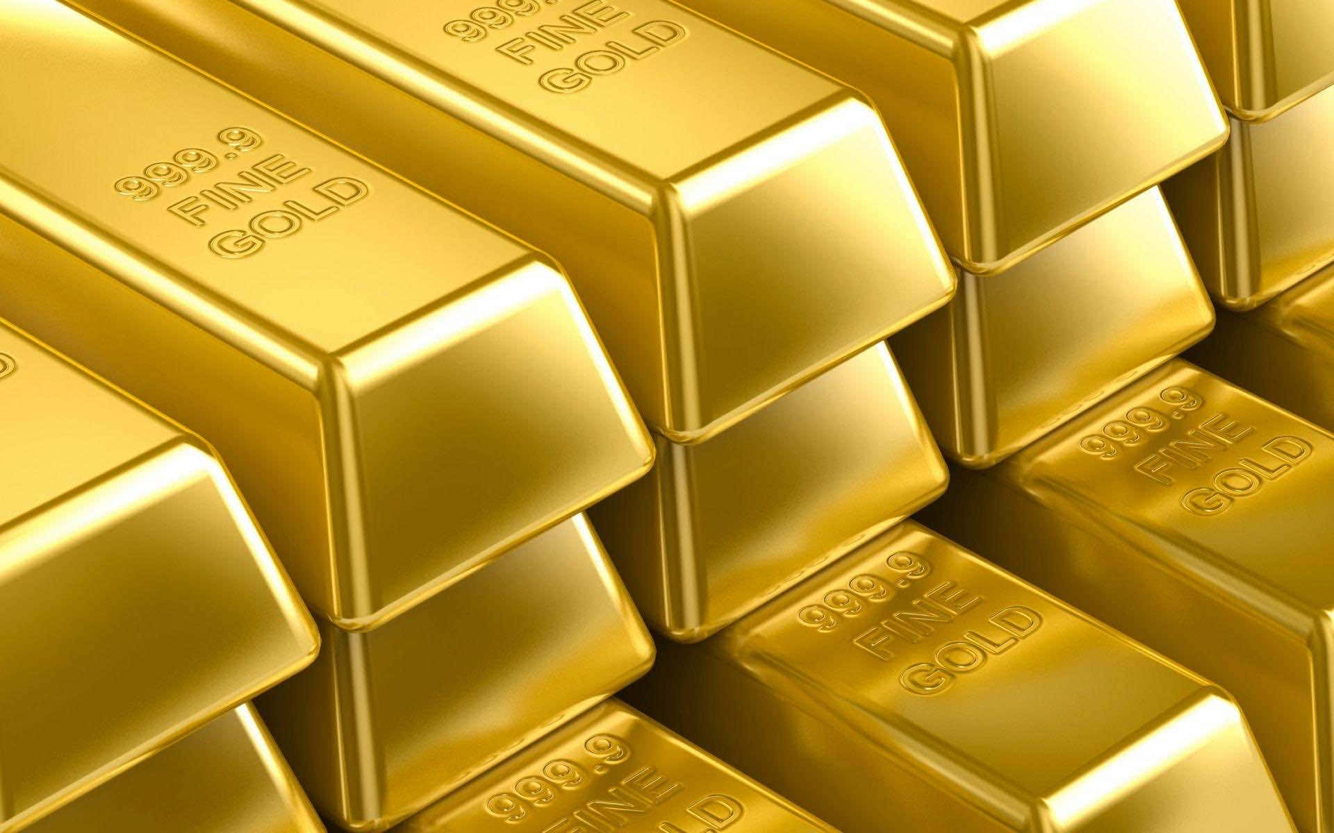 Goldbarrenauf Einem Haufen Gestapelt