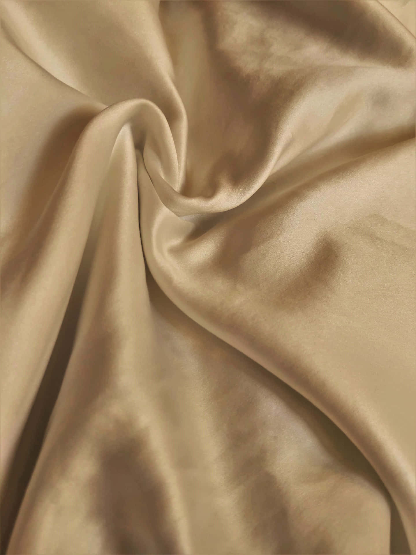 Bring a touch of luxury to your home with this golden silk wallpaper. Wallpaper
