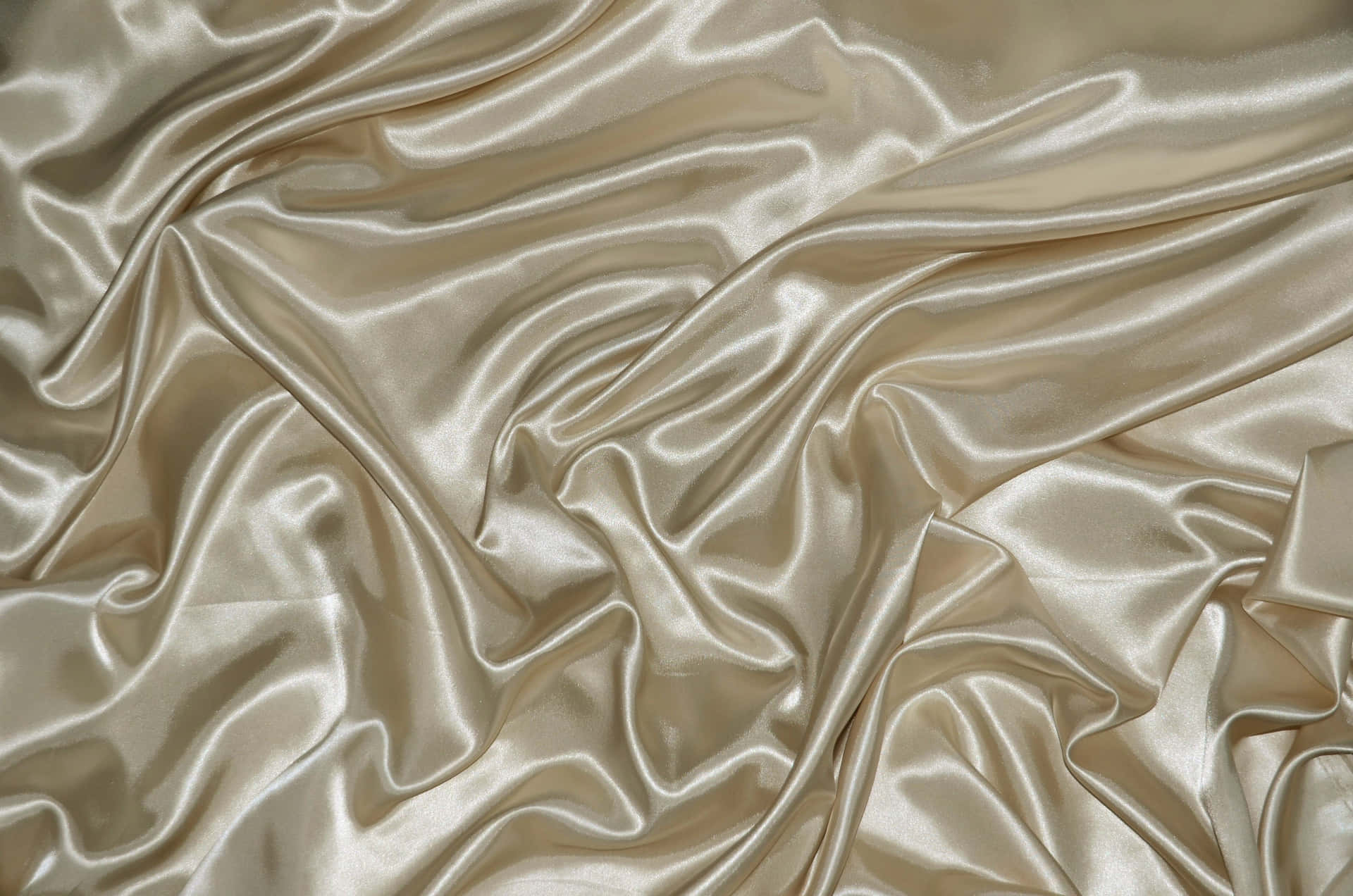 Luxurious gold silk fabric swatches Wallpaper