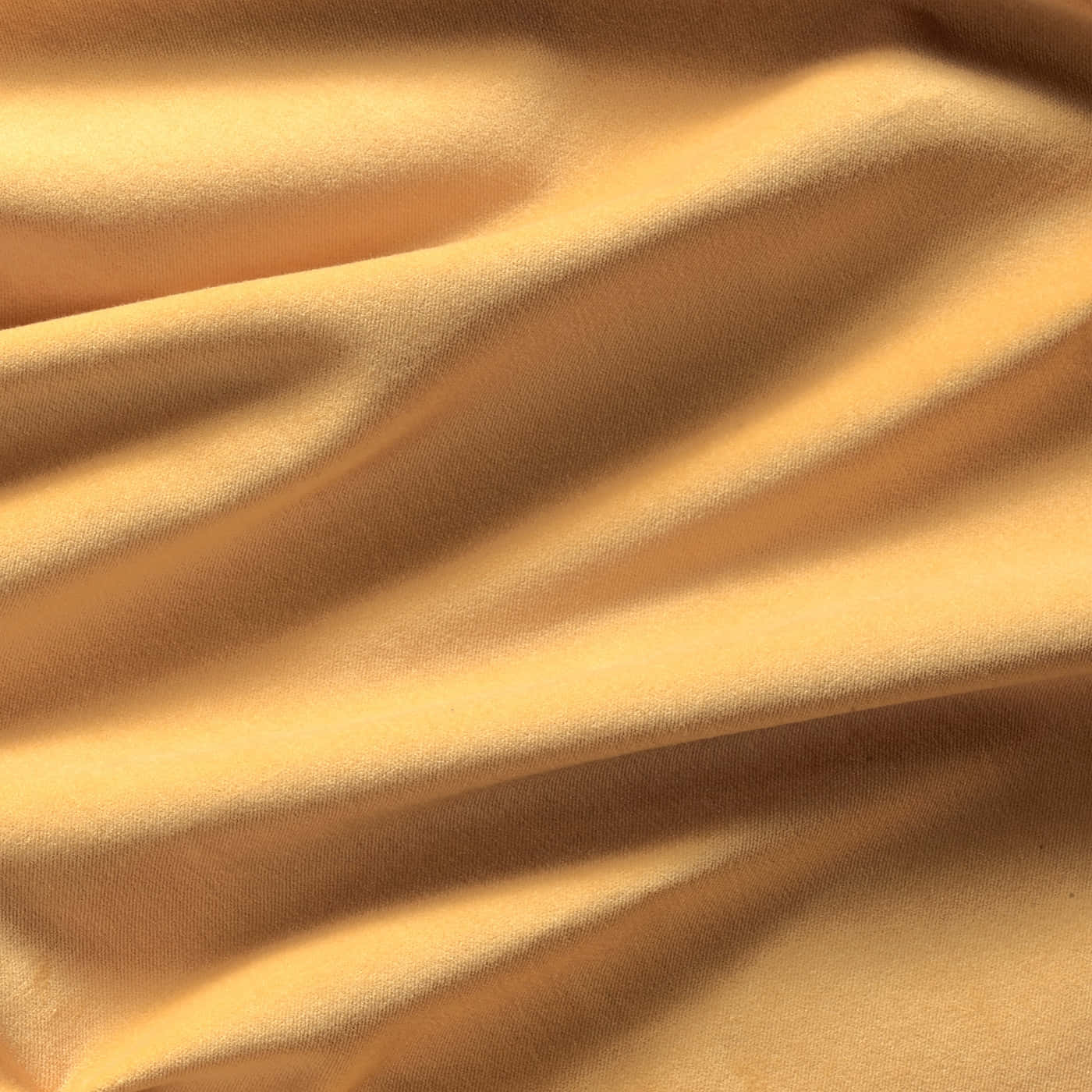 A Close Up Of A Yellow Fabric Wallpaper