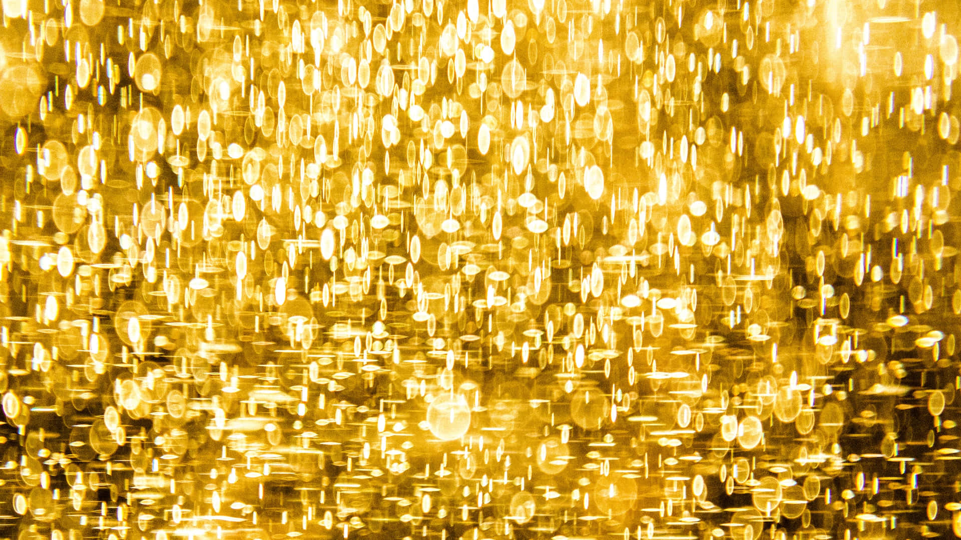 Gold Sparkle Blurry Light Background