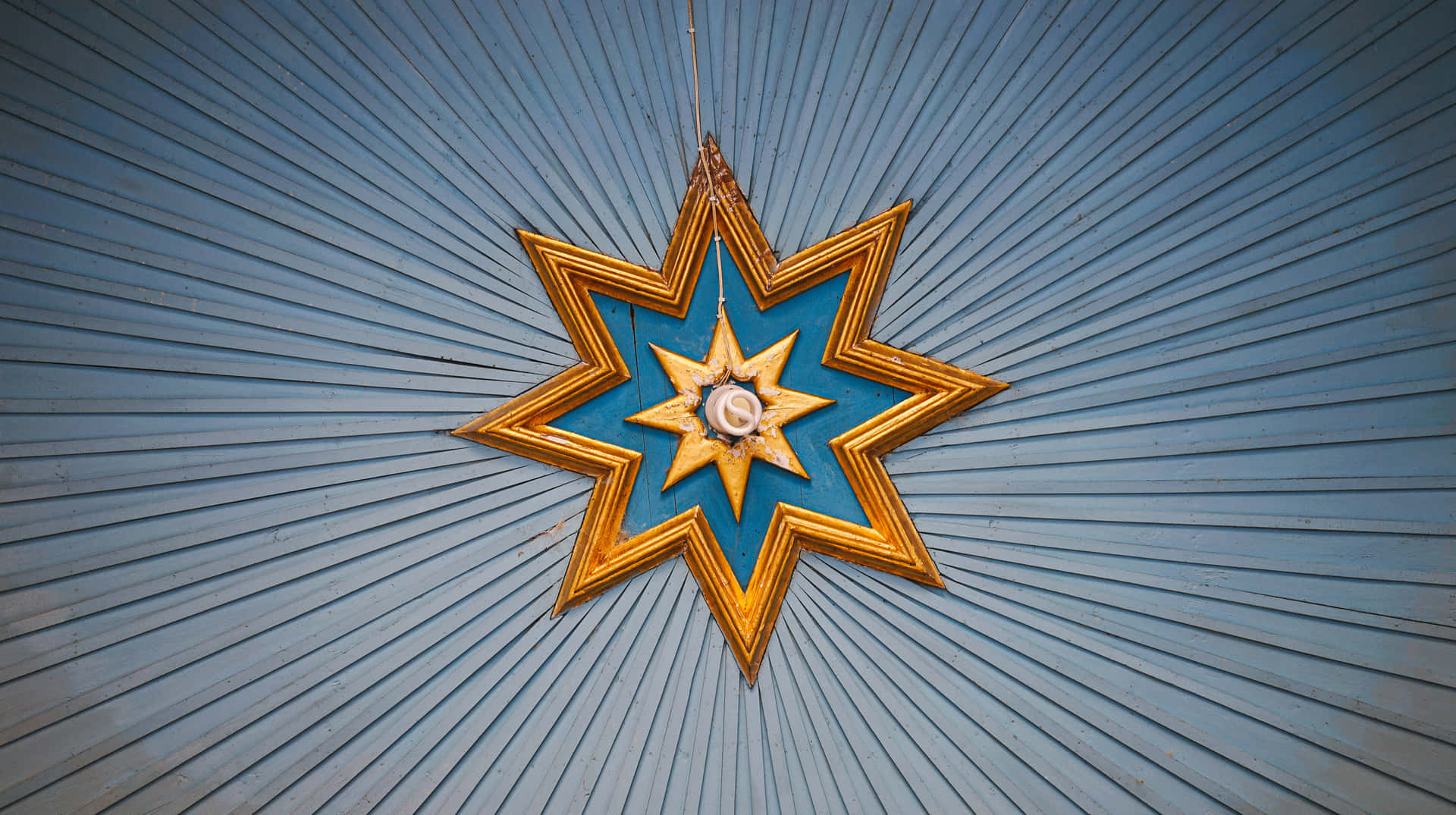 A Star Hanging From A Ceiling