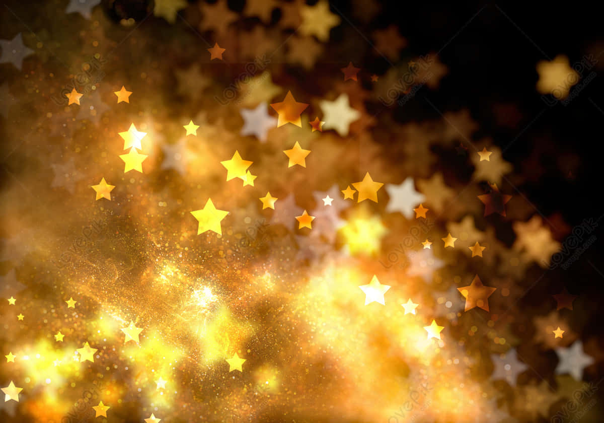 Gold Stars glimmering in the night sky Wallpaper