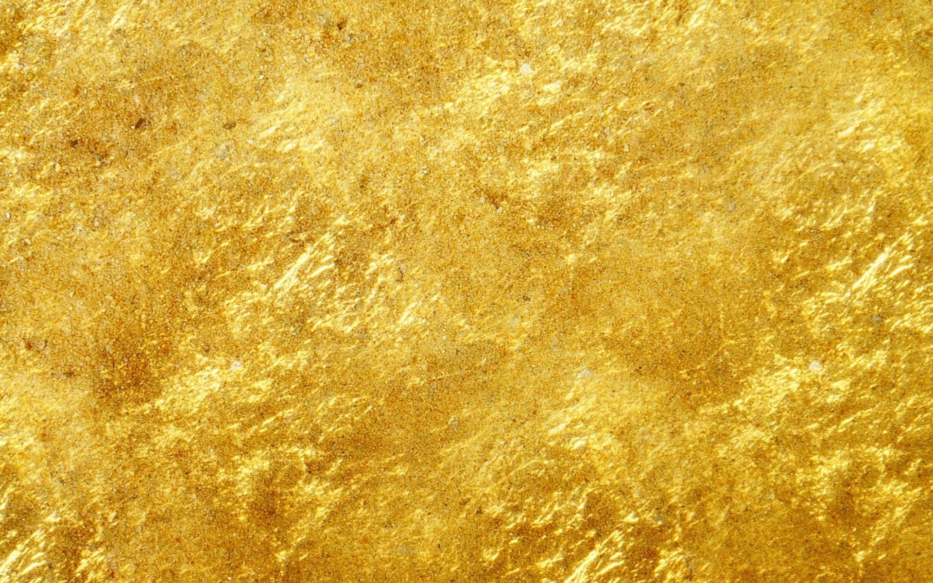 A pristine sheet of gleaming gold Wallpaper