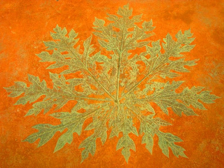 Gold Texture Leaf Against Orange Wallpaper