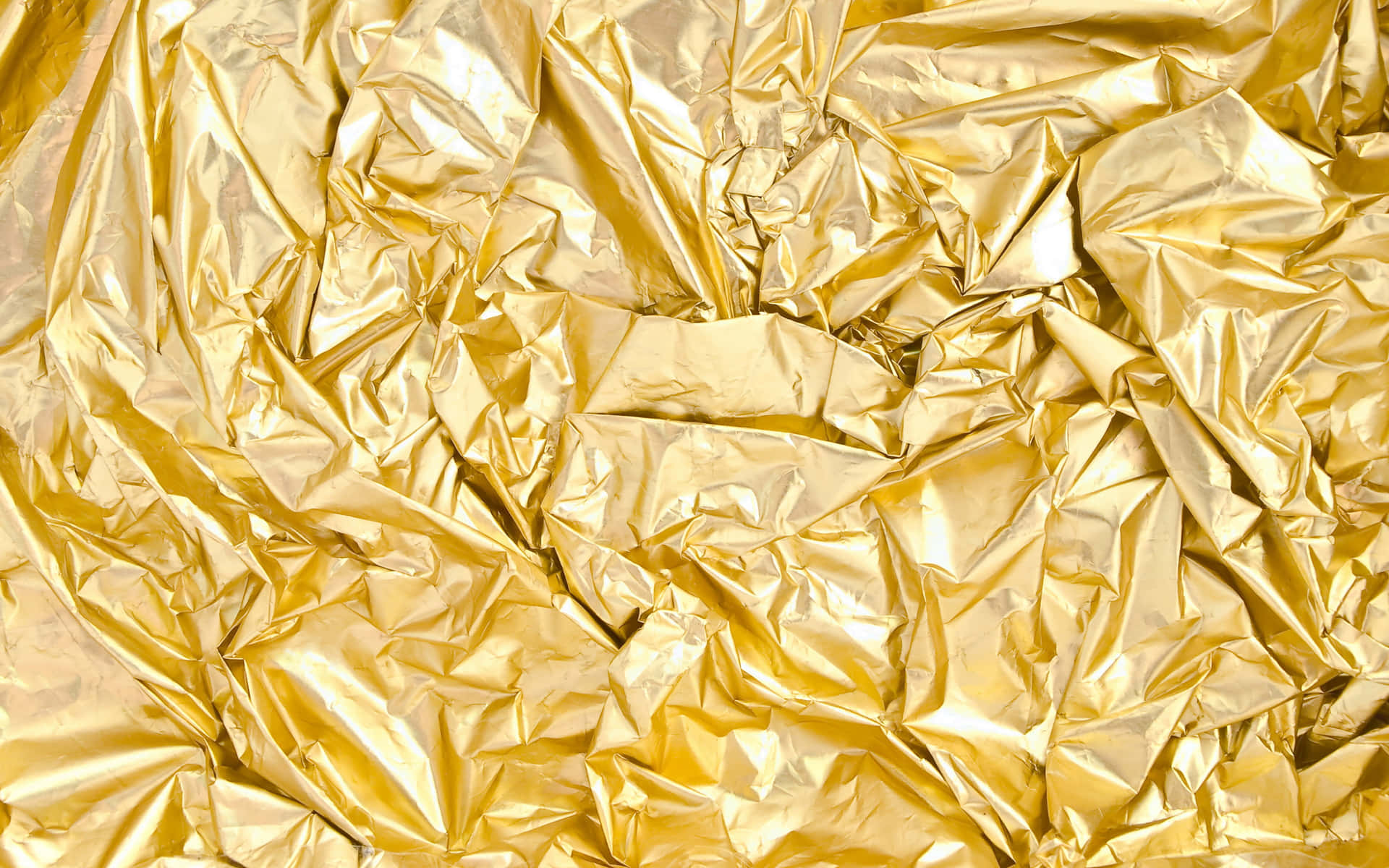 Bright Golden Crumpled Foil Background
