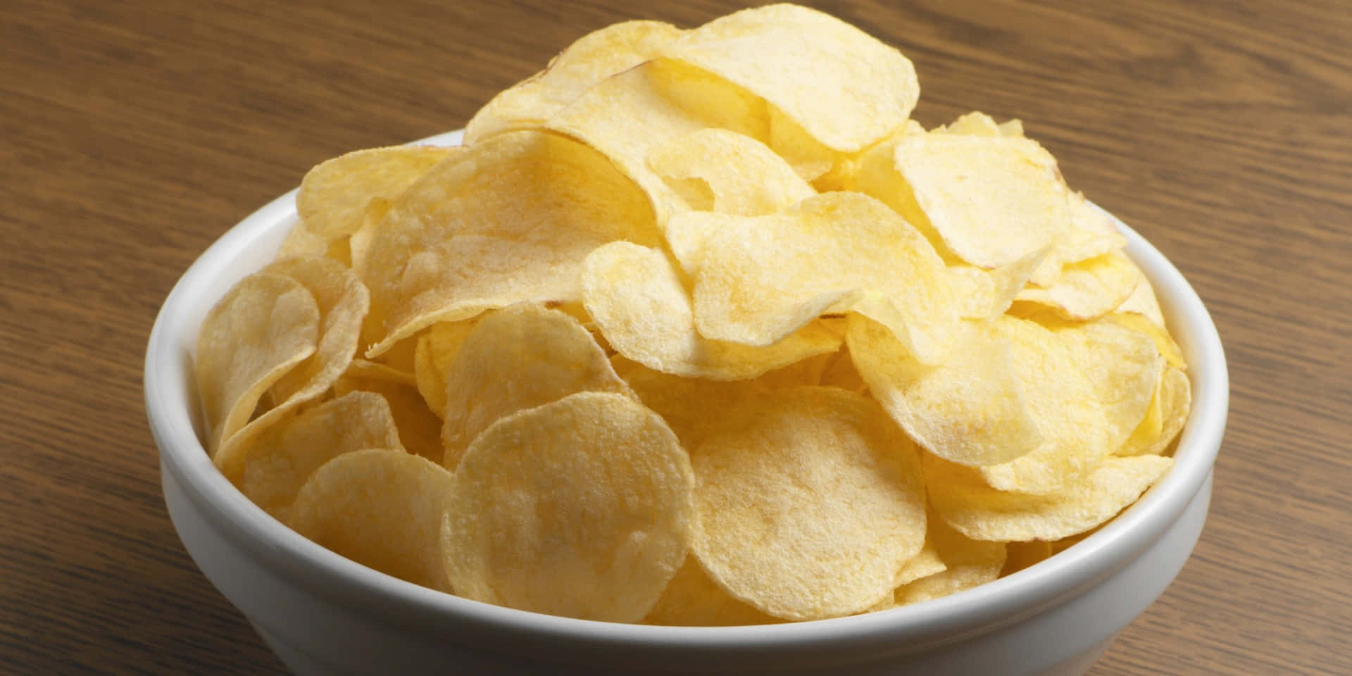 Golden Chips In White Bowl Wallpaper