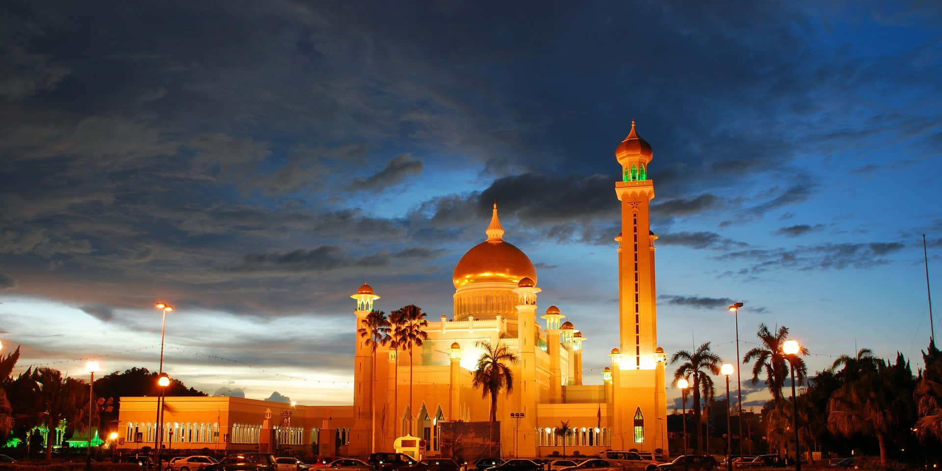 Golden Domed Mosqueat Dusk Wallpaper