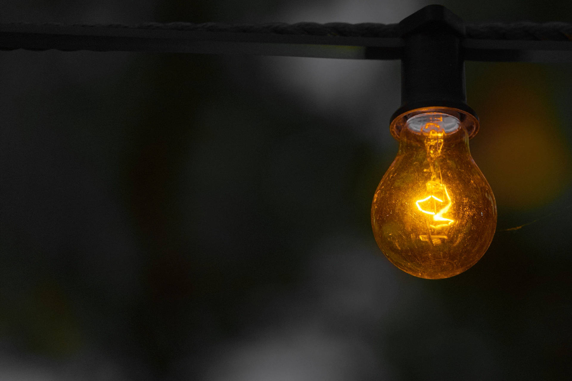 Golden Electricity Powered Light Bulb Picture