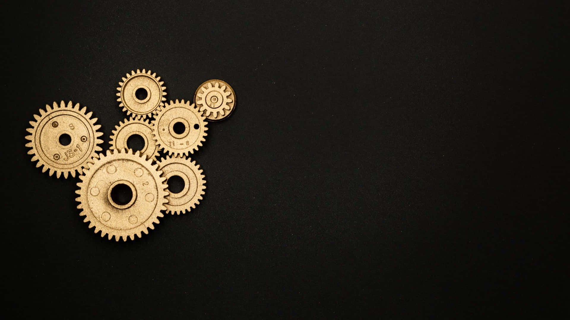 Golden Gearson Black Background Wallpaper