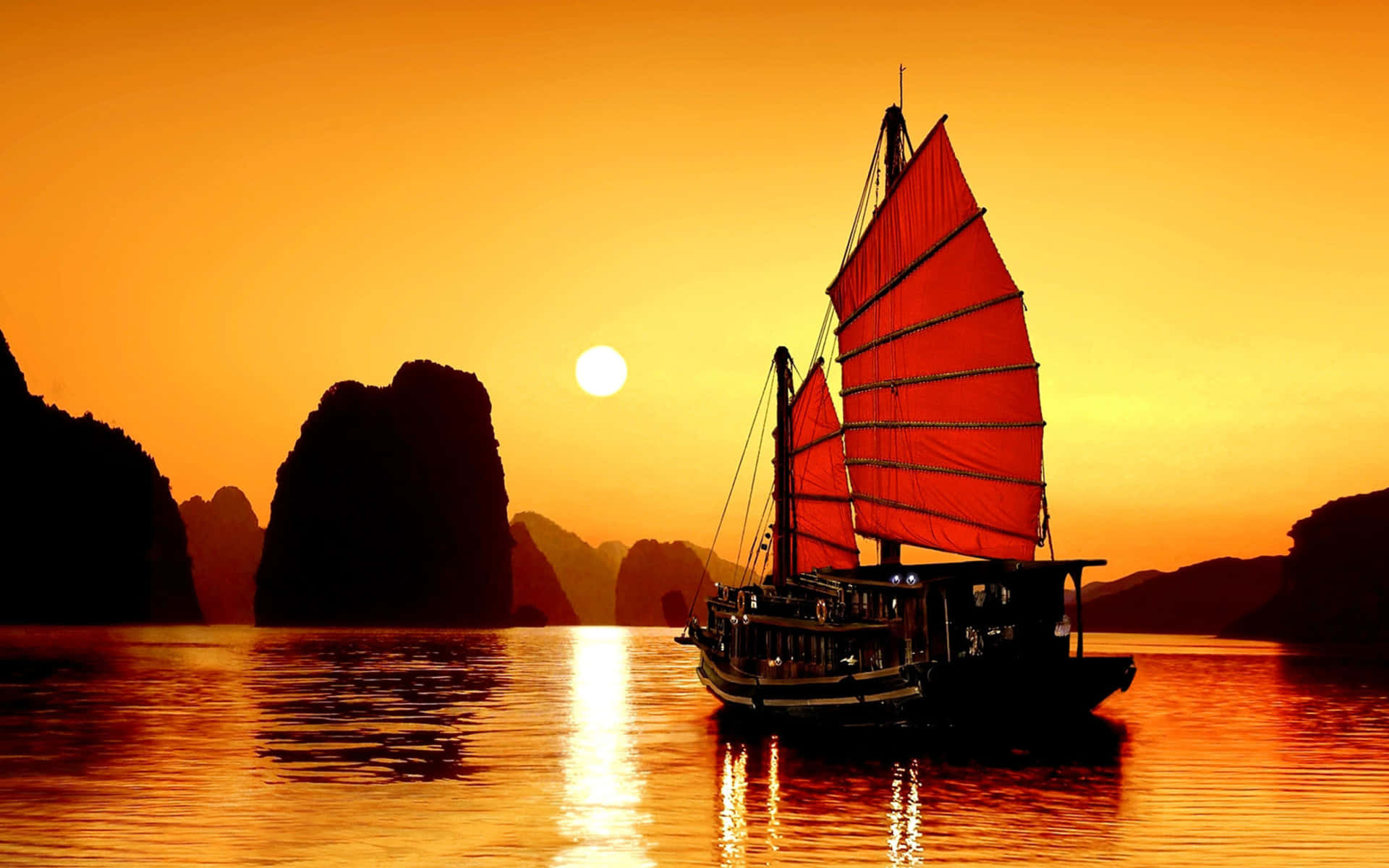 Golden Sky With Red Ship On Halong Bay Wallpaper