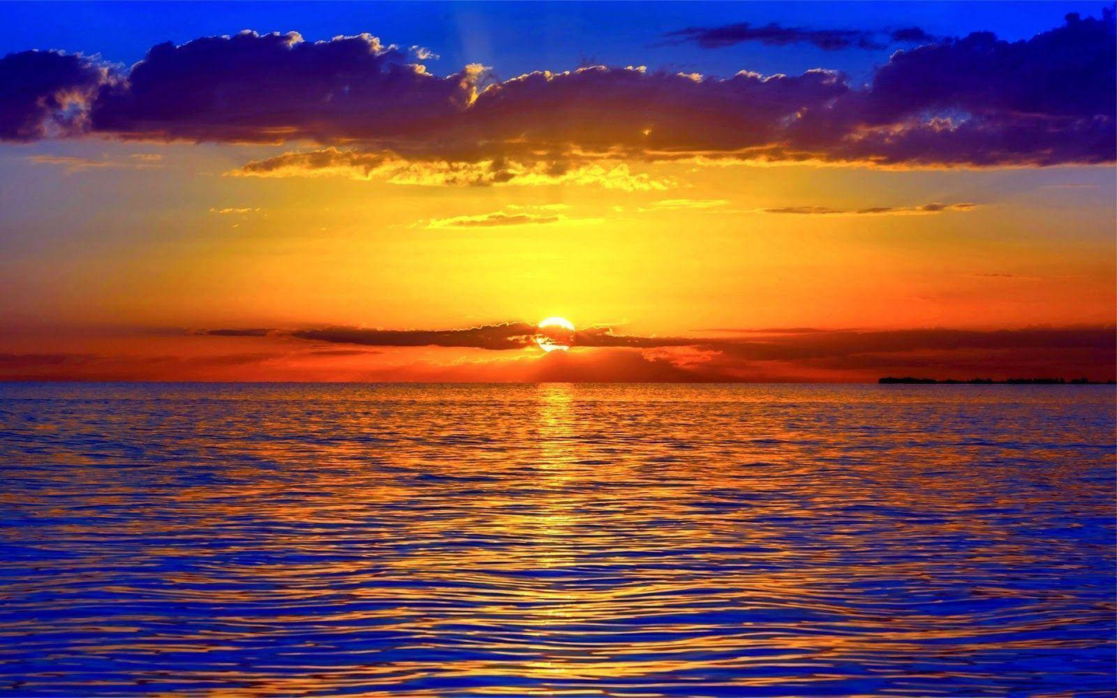 Golden Sunset Purple Sky Ocean Wallpaper