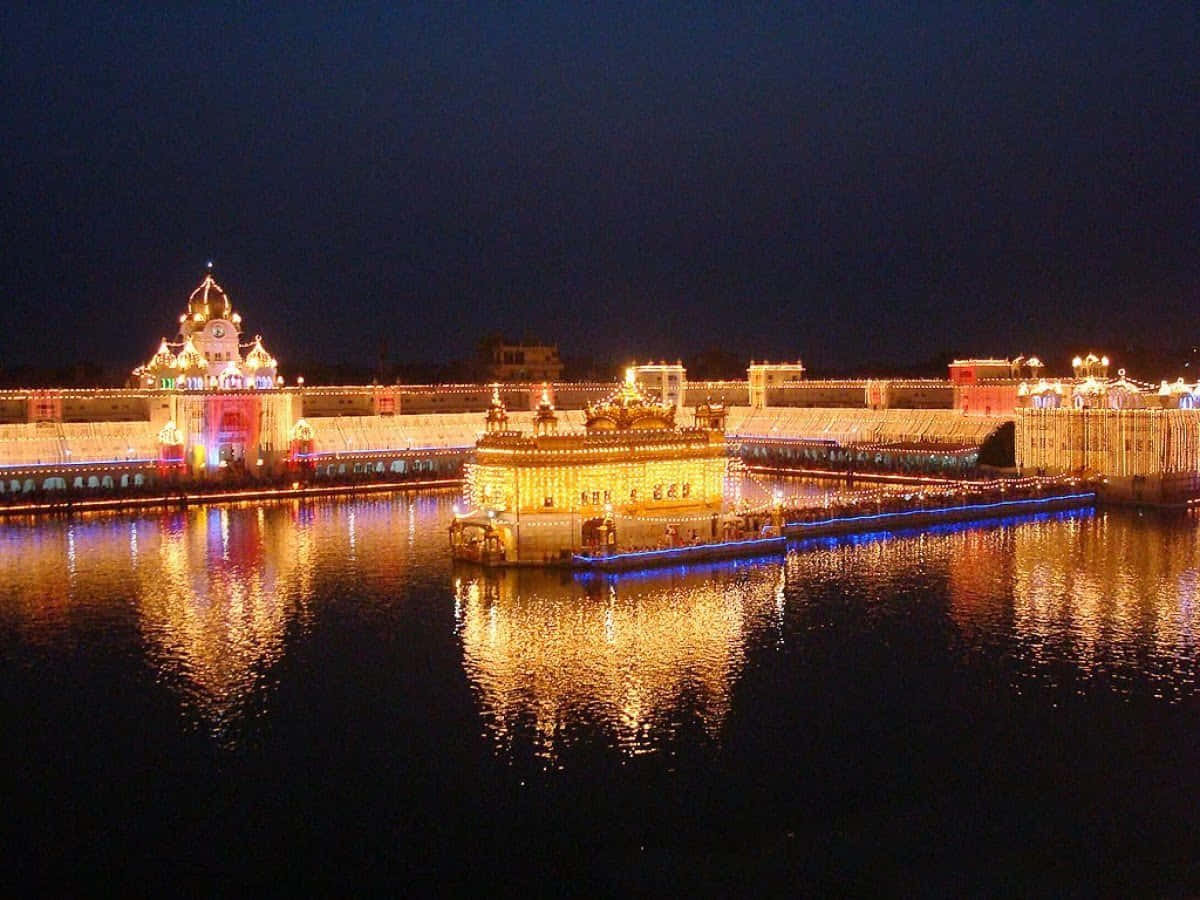 The Golden Temple Glowing at Night