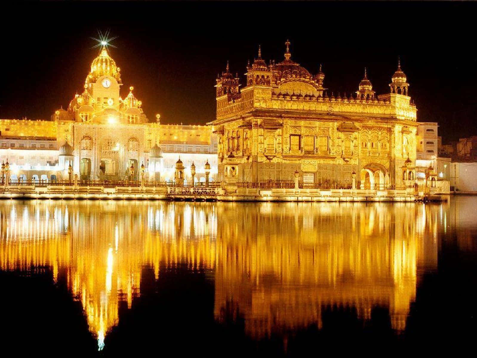 Majestic Golden Temple Reflecting on Amritsar's Holy Sarovar