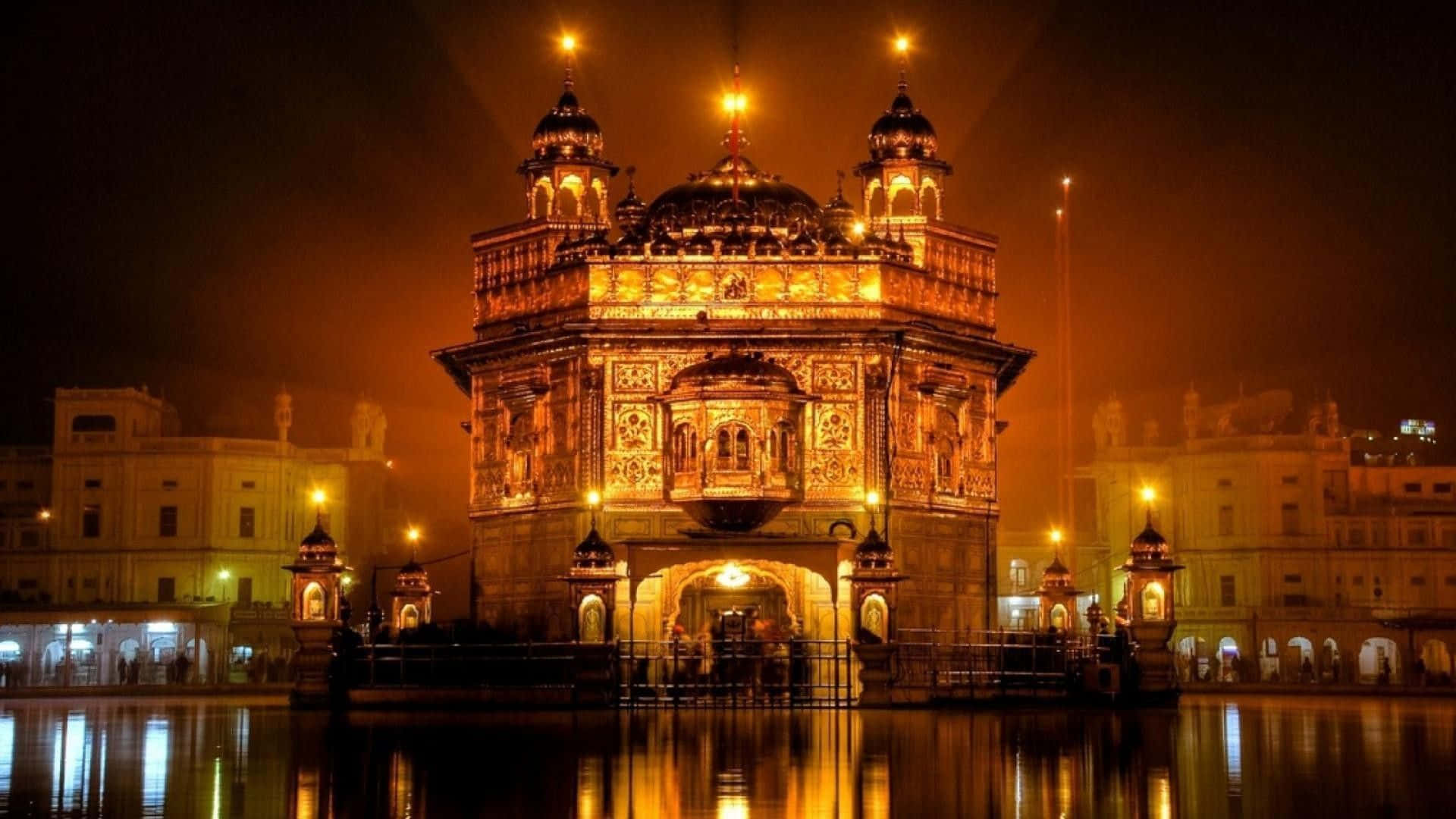 Serene Reflection of the Golden Temple at Sunset