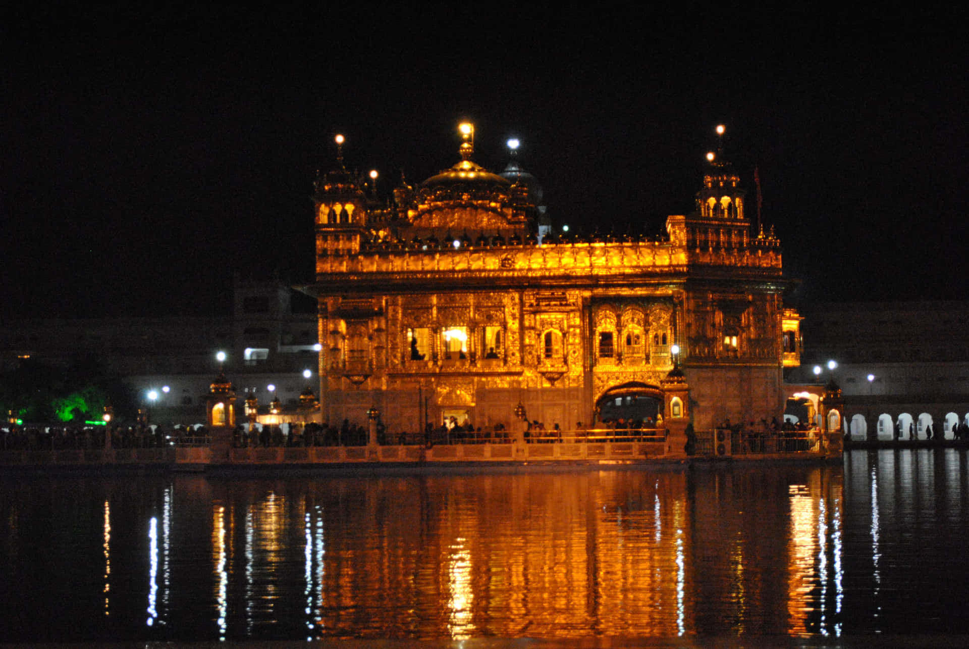 Serene Golden Temple Reflection at Dawn