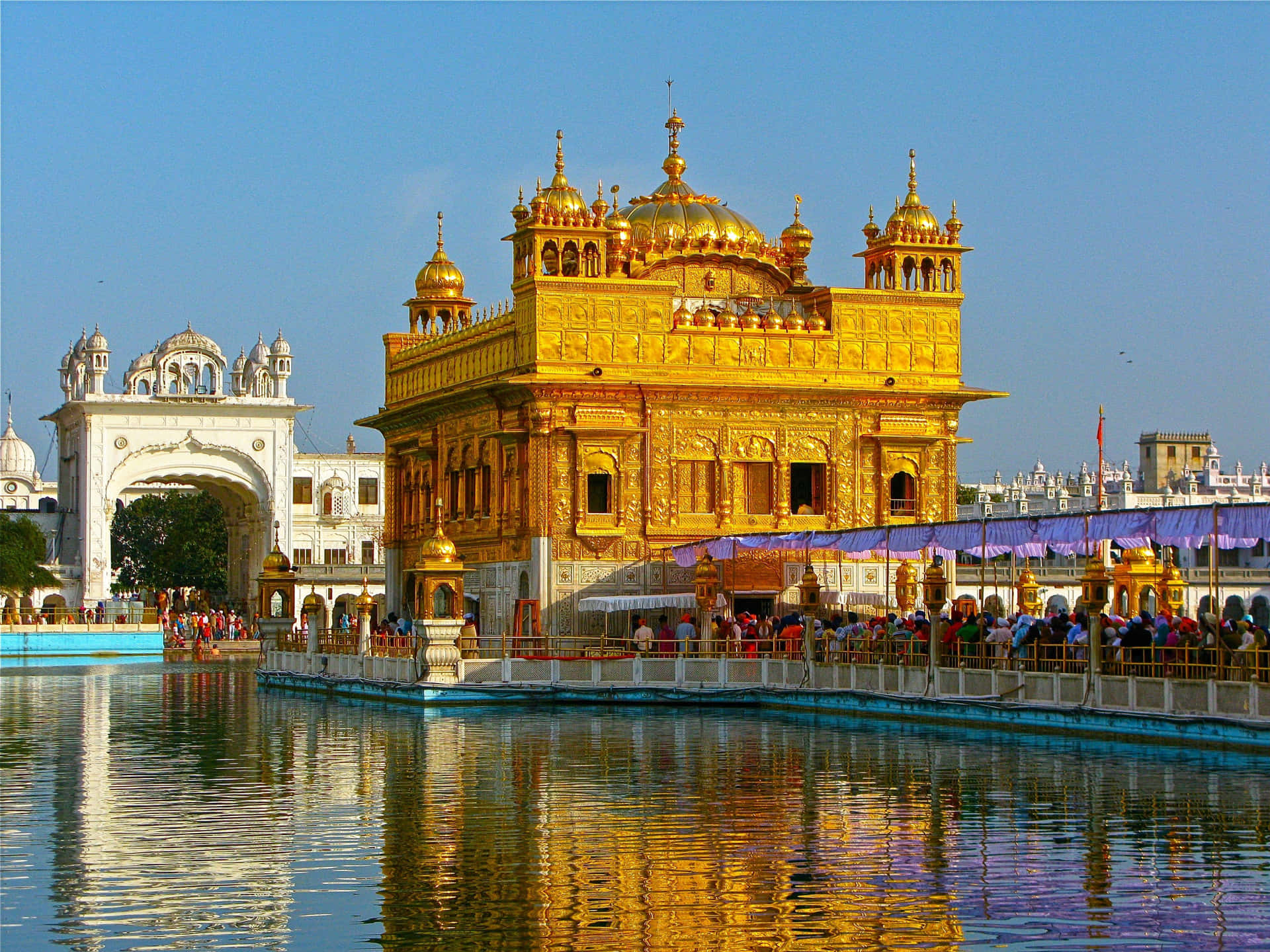 Majestic Golden Temple Reflection at Sunset
