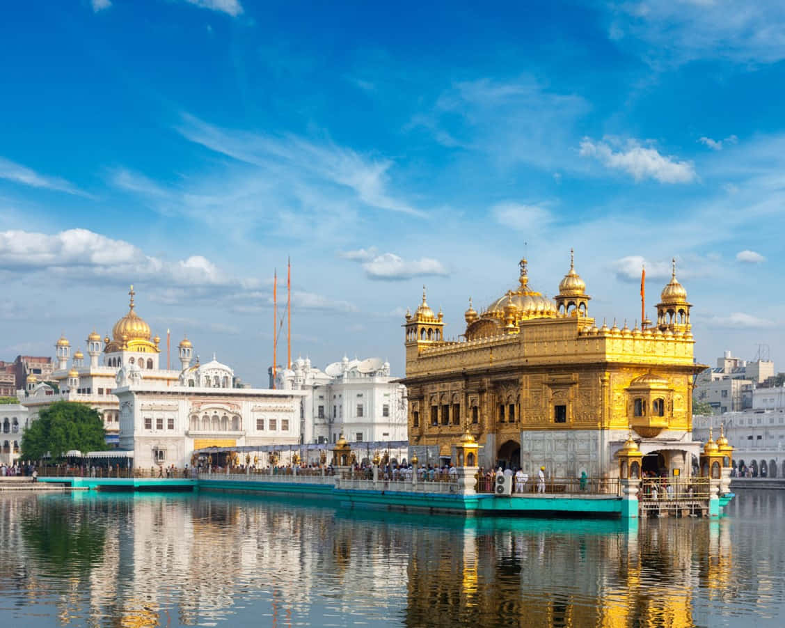 Golden Temple With Green-Lined Causeway Wallpaper
