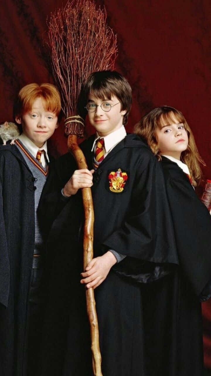 Celebrate the Power of Three with the Golden Trio Wallpaper
