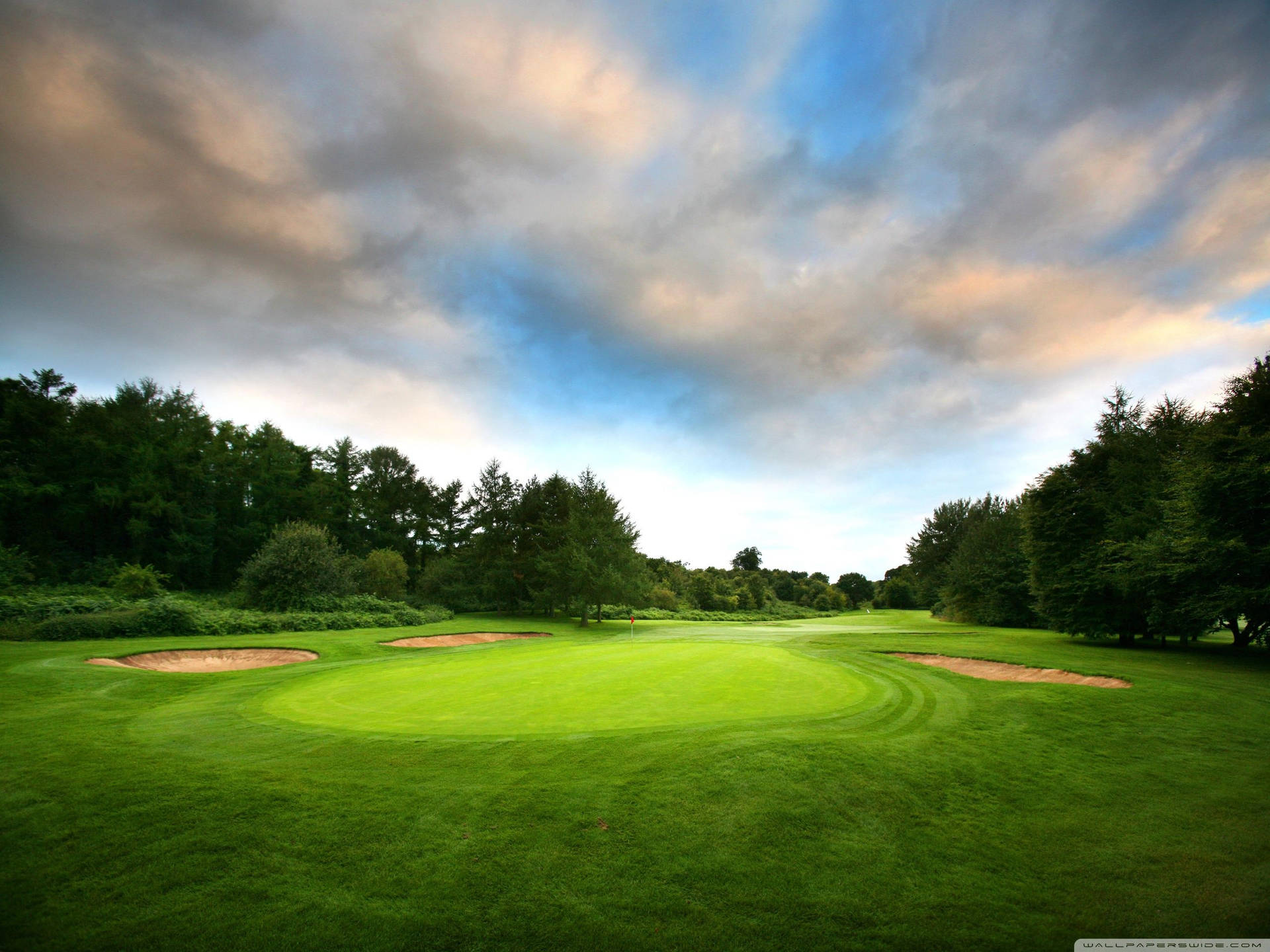 Golf Course Under The Clouds Wallpaper
