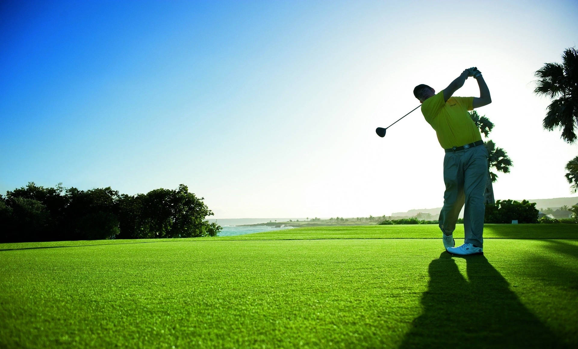 Golfer Strike In Golf Course Wallpaper