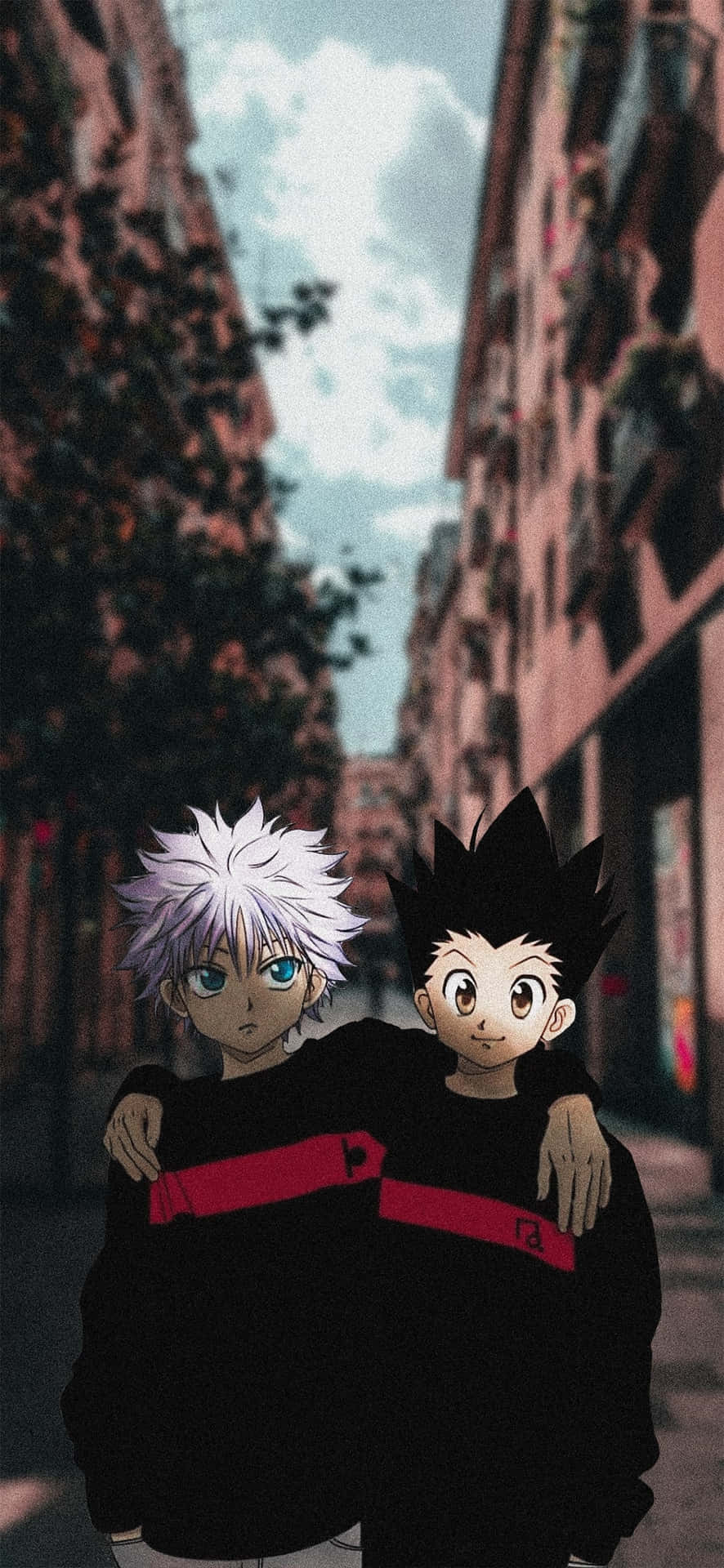 Add thrill and excitement to your phone with the dynamic duo of Gon and Killua! Wallpaper