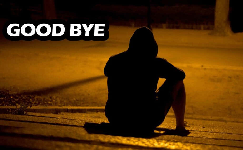 A Man Sitting On The Steps At Night With The Words Good Bye