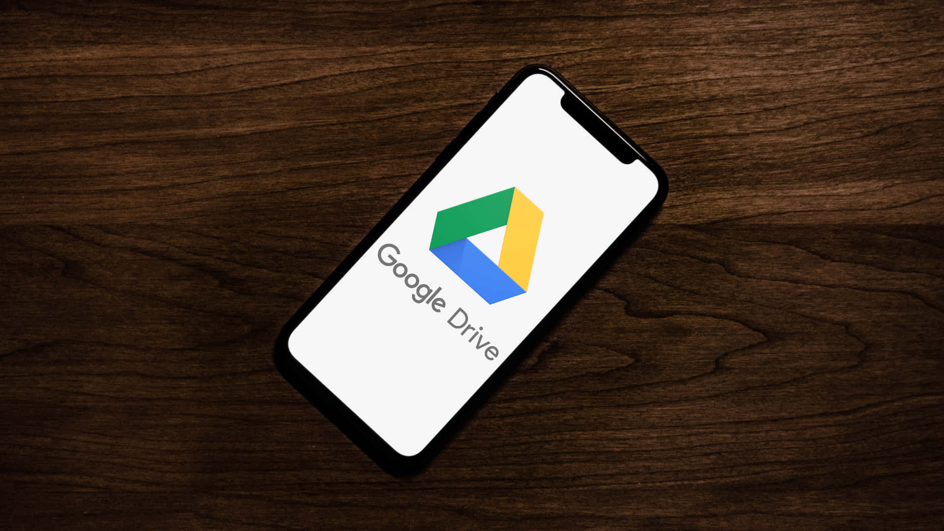 Google Drive On Wooden Table Wallpaper
