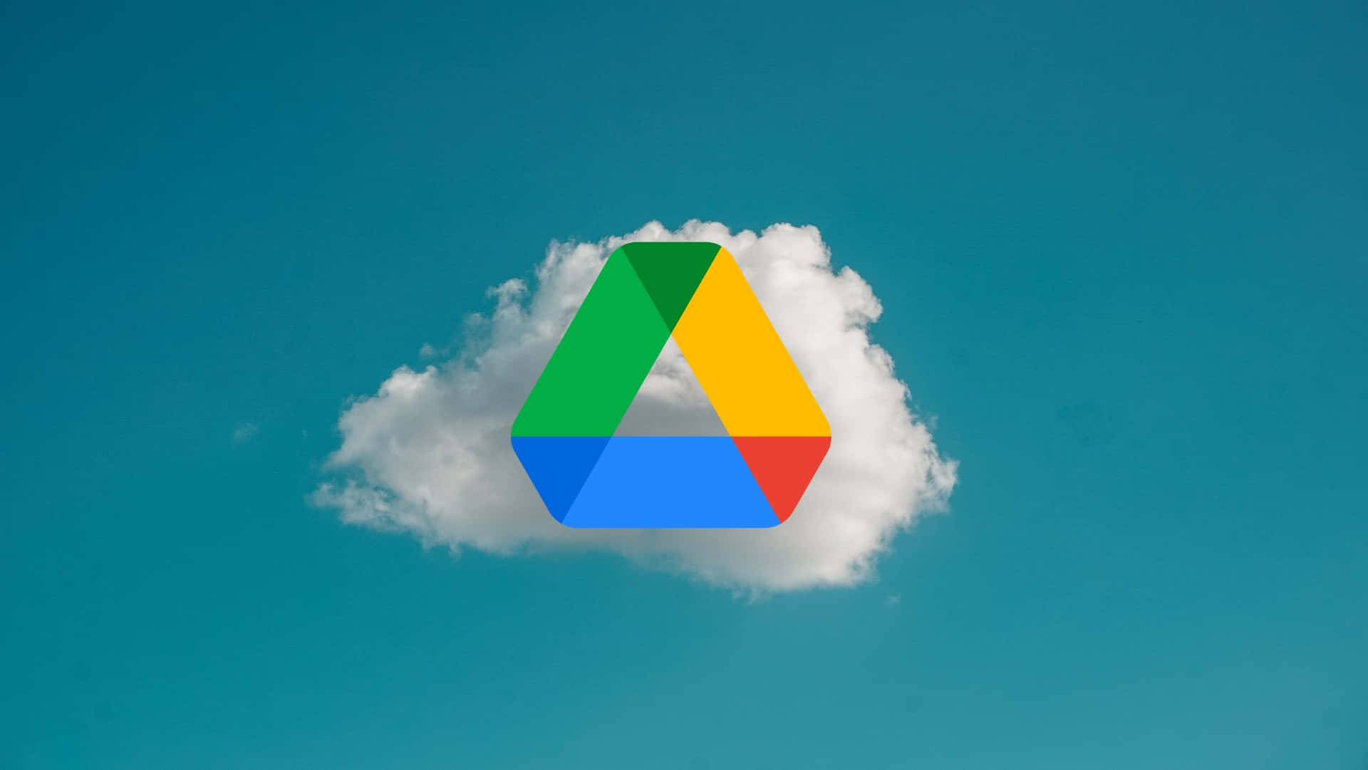 Google Drive With Clouds Behind Wallpaper
