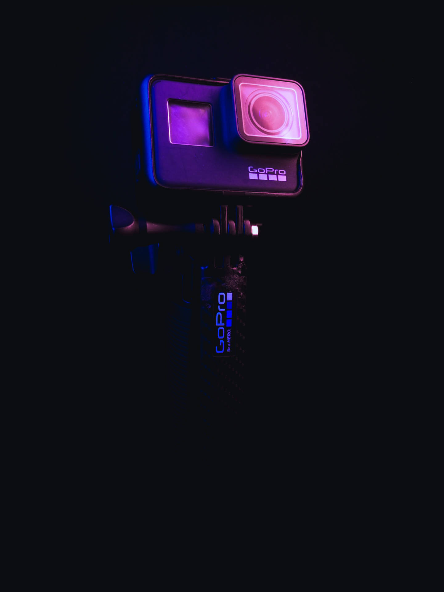 Gopro In Neon Purple Light Background