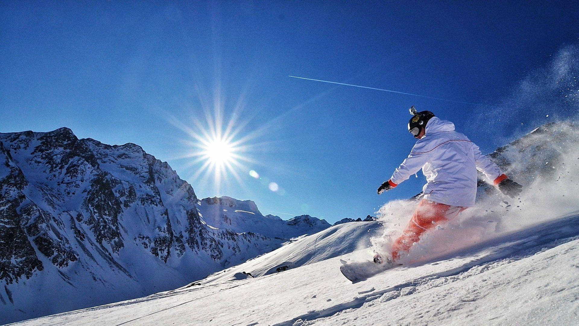 Gopro Snowboarder Going Downhill Wallpaper