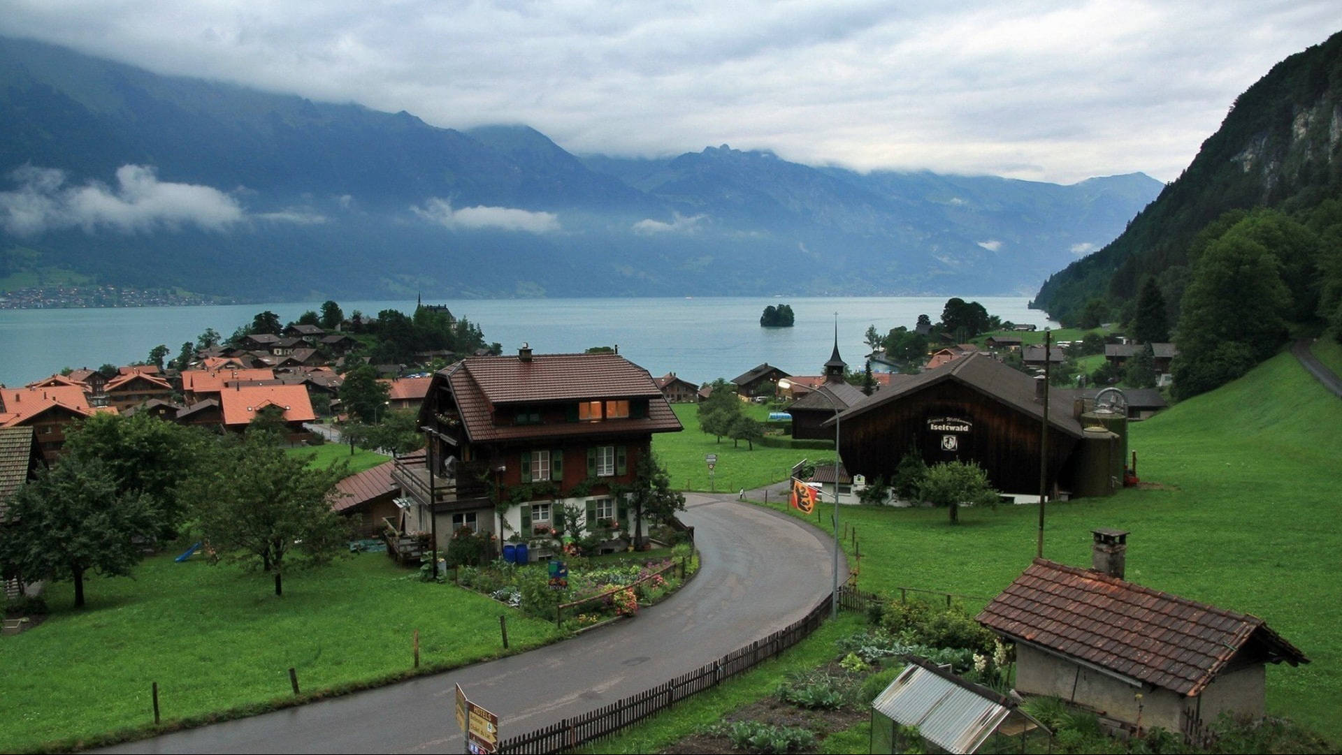 Scenic view of Iseltwald village, Switzerland Wallpaper
