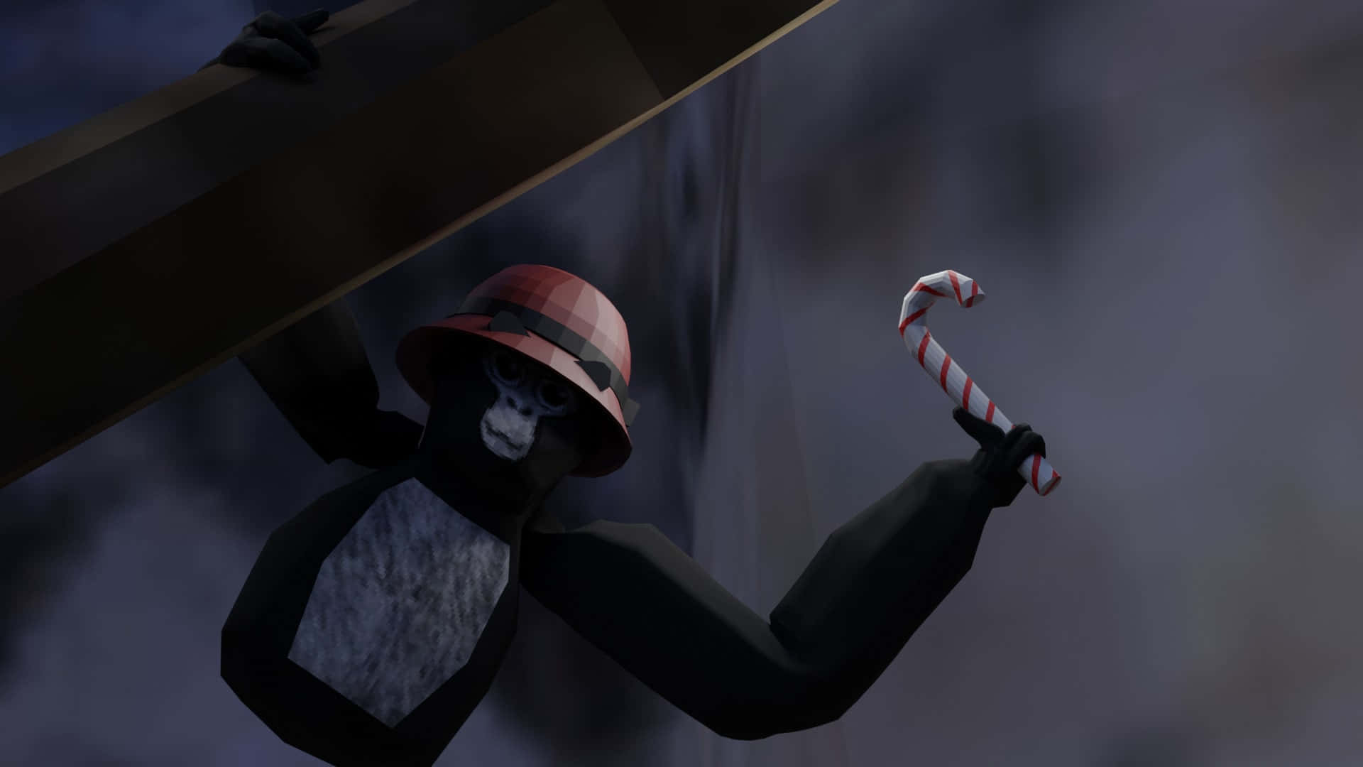 Dark Gorilla Tag Holding A Candy Cane Wallpaper