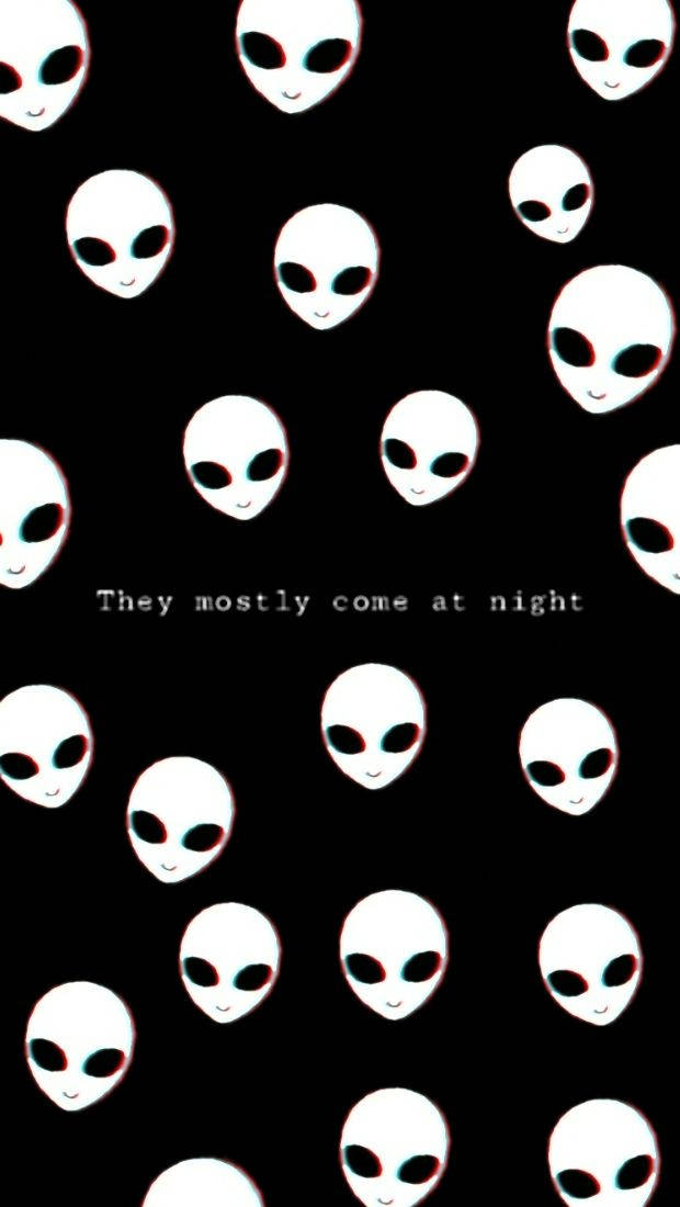 En sort baggrund med hvide aliens ansigter Wallpaper