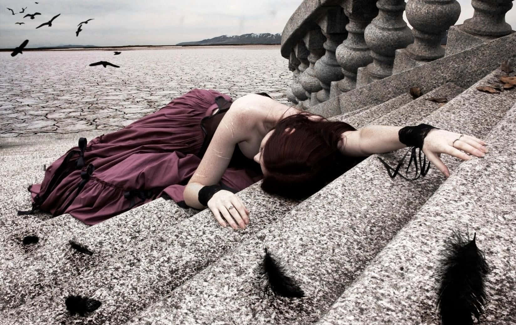 Goth Woman Profile Lying On Stairs Wallpaper