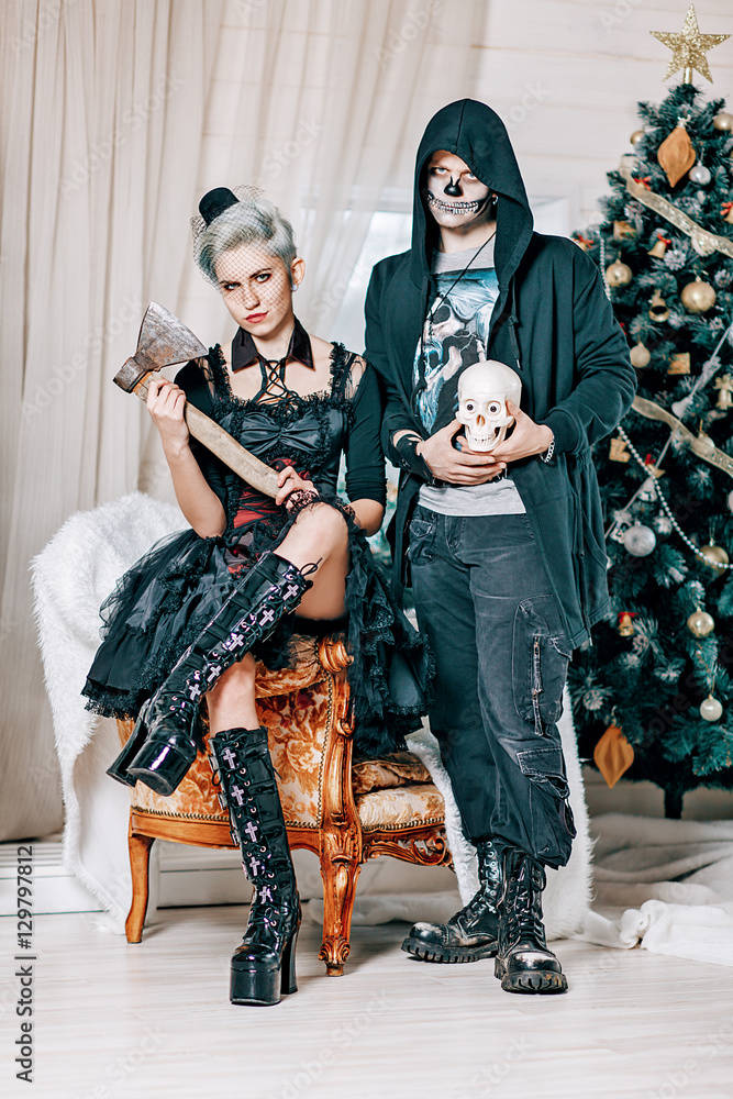 Couple Celebrating A Gothic Christmas Wallpaper