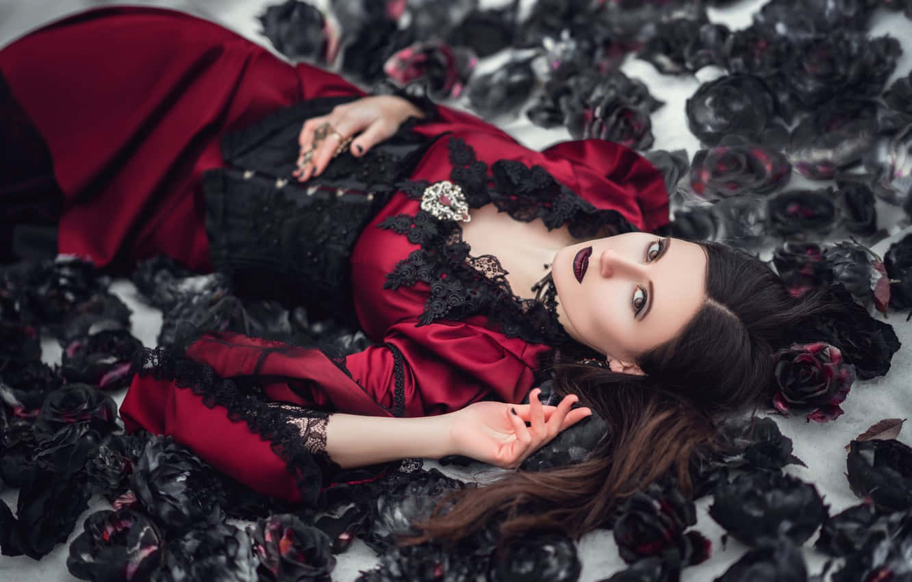 Dark and Mysterious Woman in Gothic Fashion Wallpaper