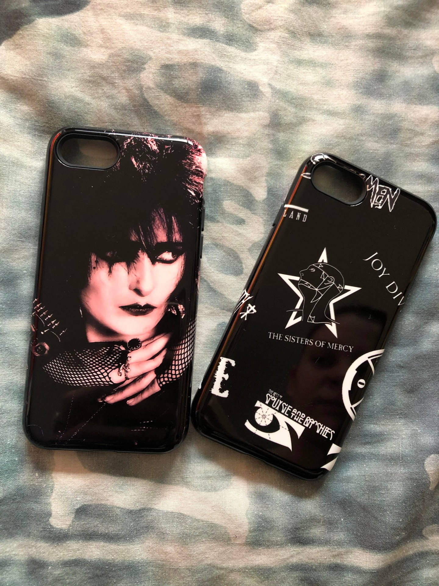 Two Phone Cases With A Black And White Image Wallpaper