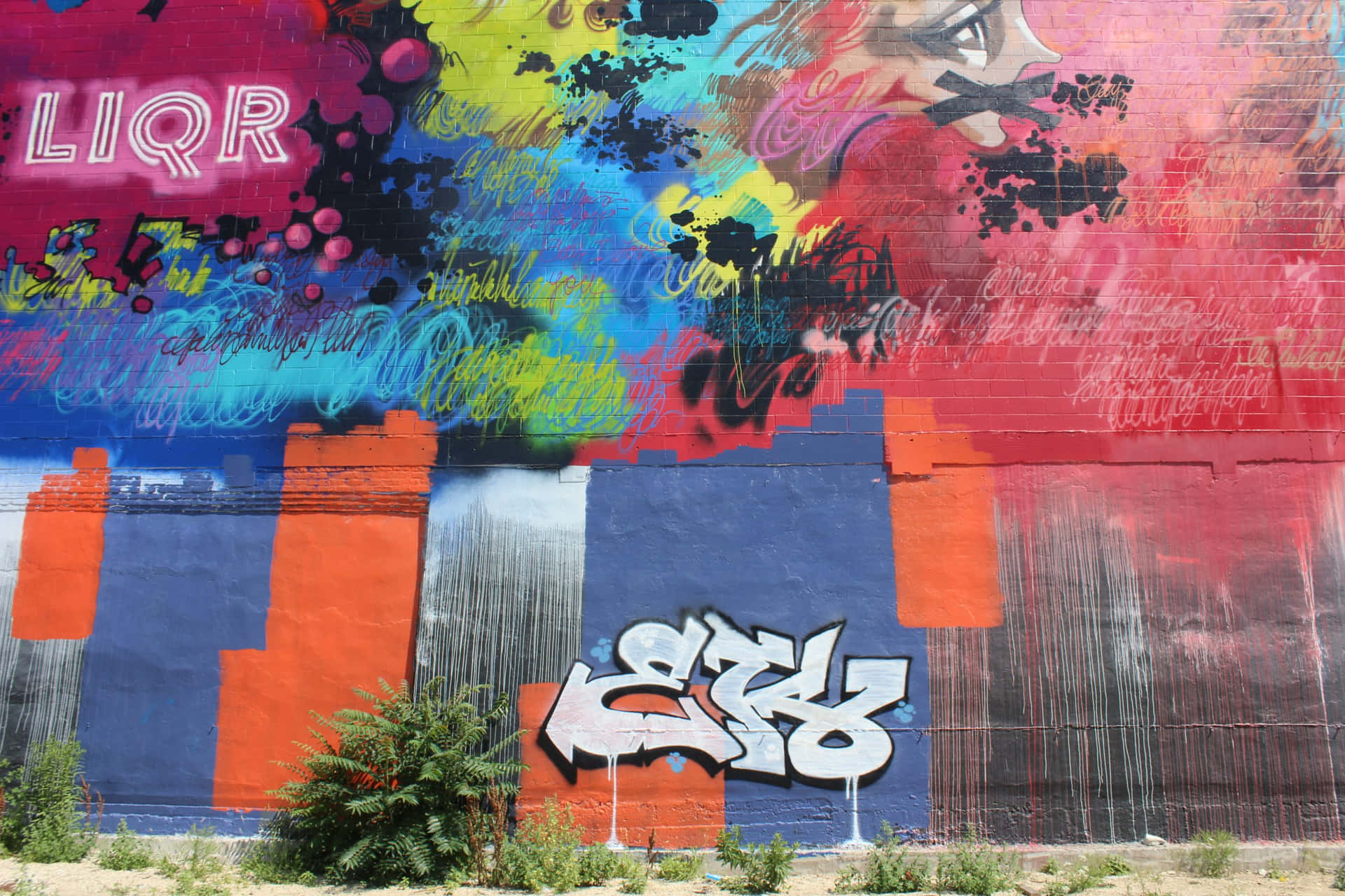 "A vibrant and captivating graffiti art mural brightens up the city streets"