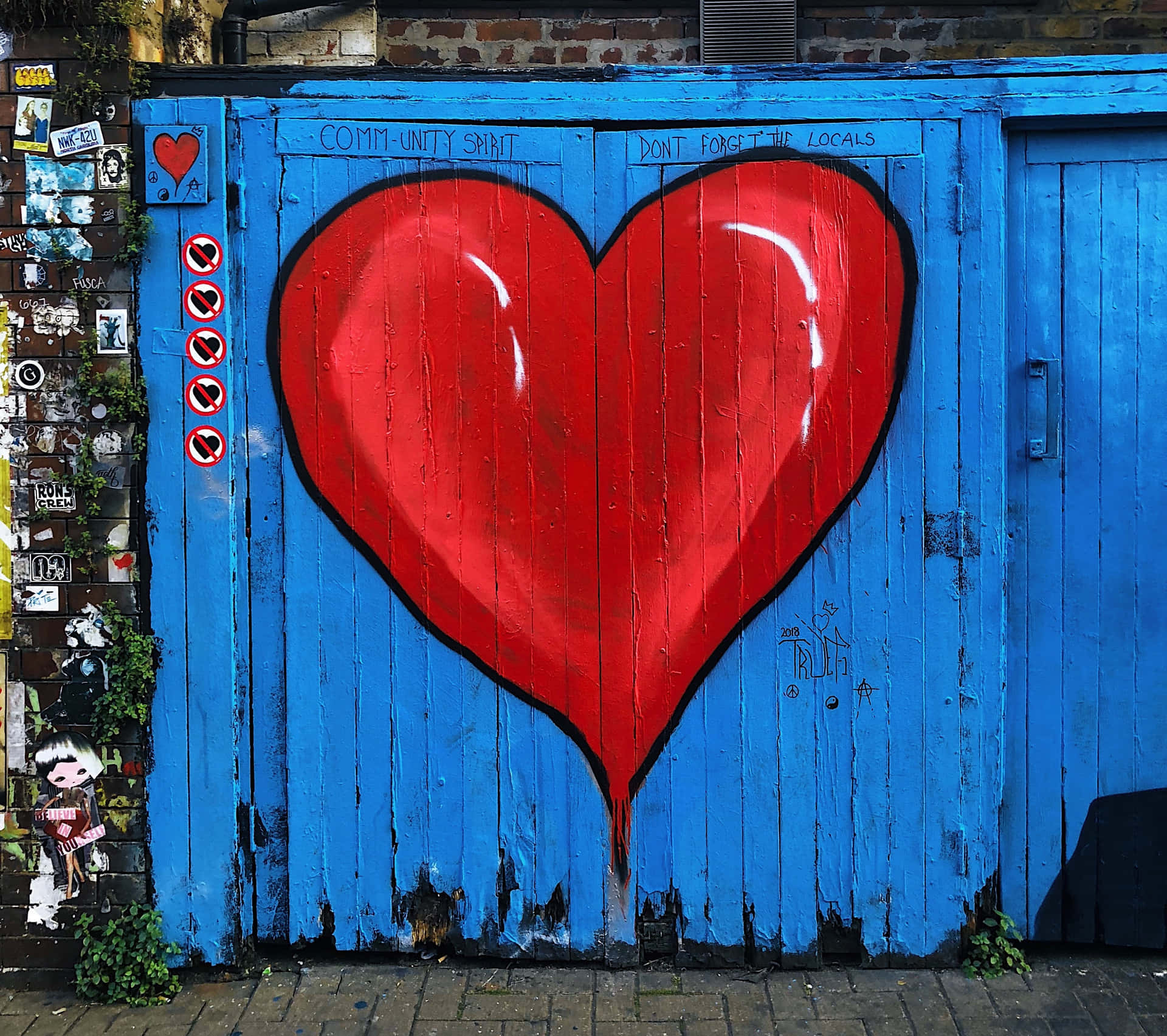 A Blue Door With A Heart On It