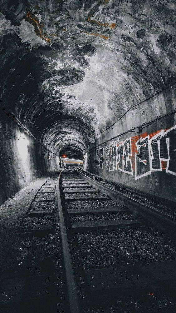 Graffiti On Underground Train Tunnel Background