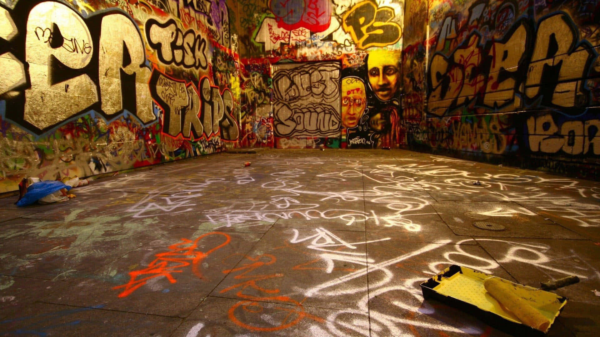 Graffiti Wall Art Extending To The Ground Wallpaper