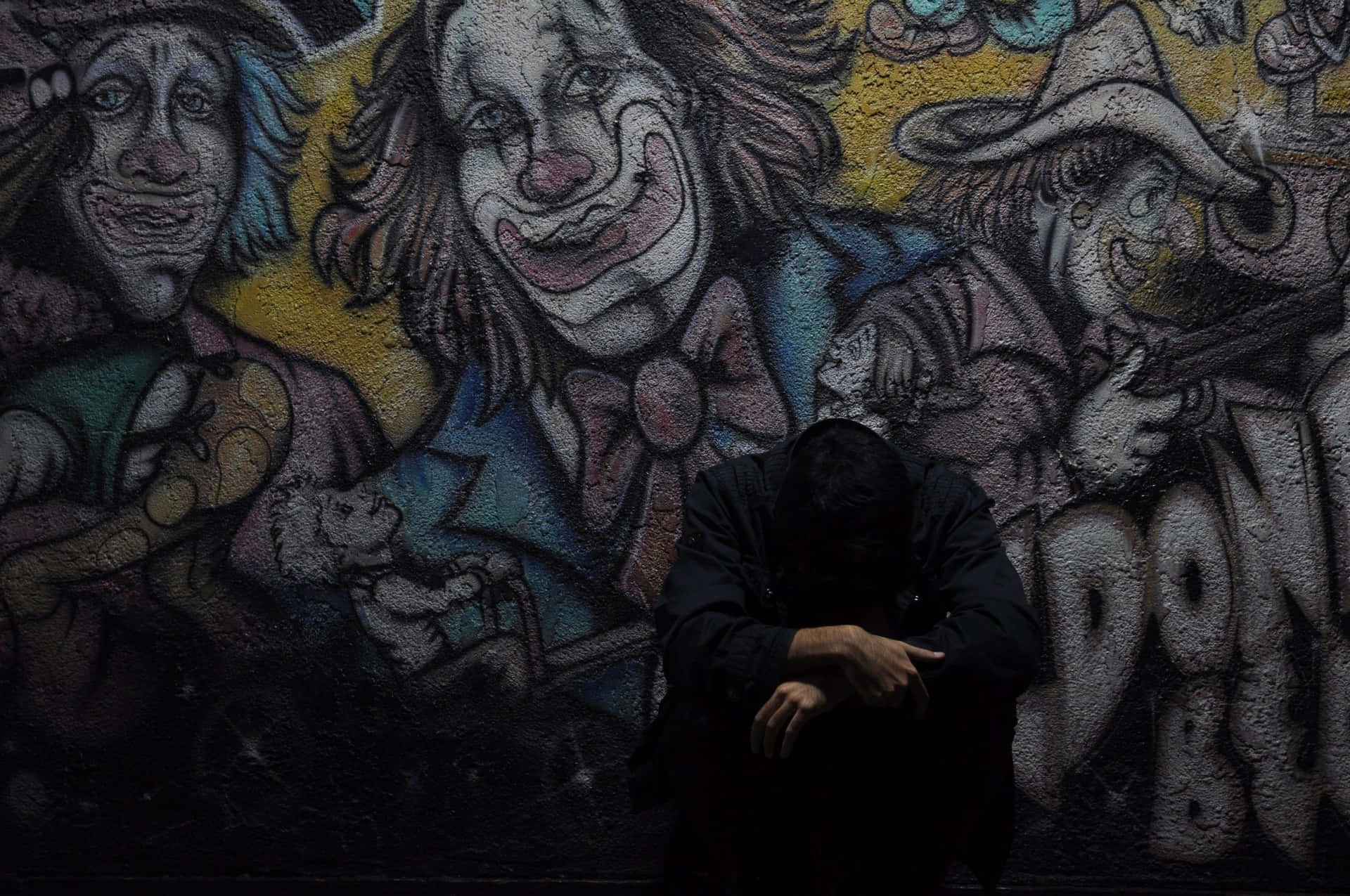 Graffiti Wall Art Of Sad Clowns Wallpaper
