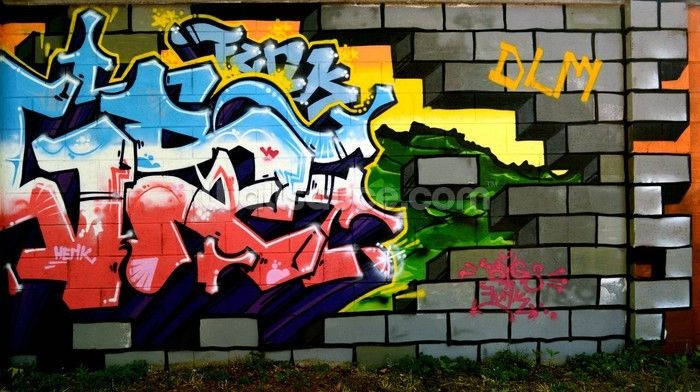 Vibrant Expression on a Graffiti Mural Wall Wallpaper