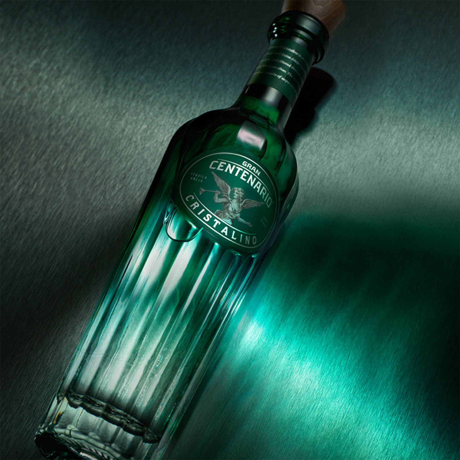 "The Superior Taste - Gran Centenario Cristalino Tequila in Cyan Bottle" Wallpaper