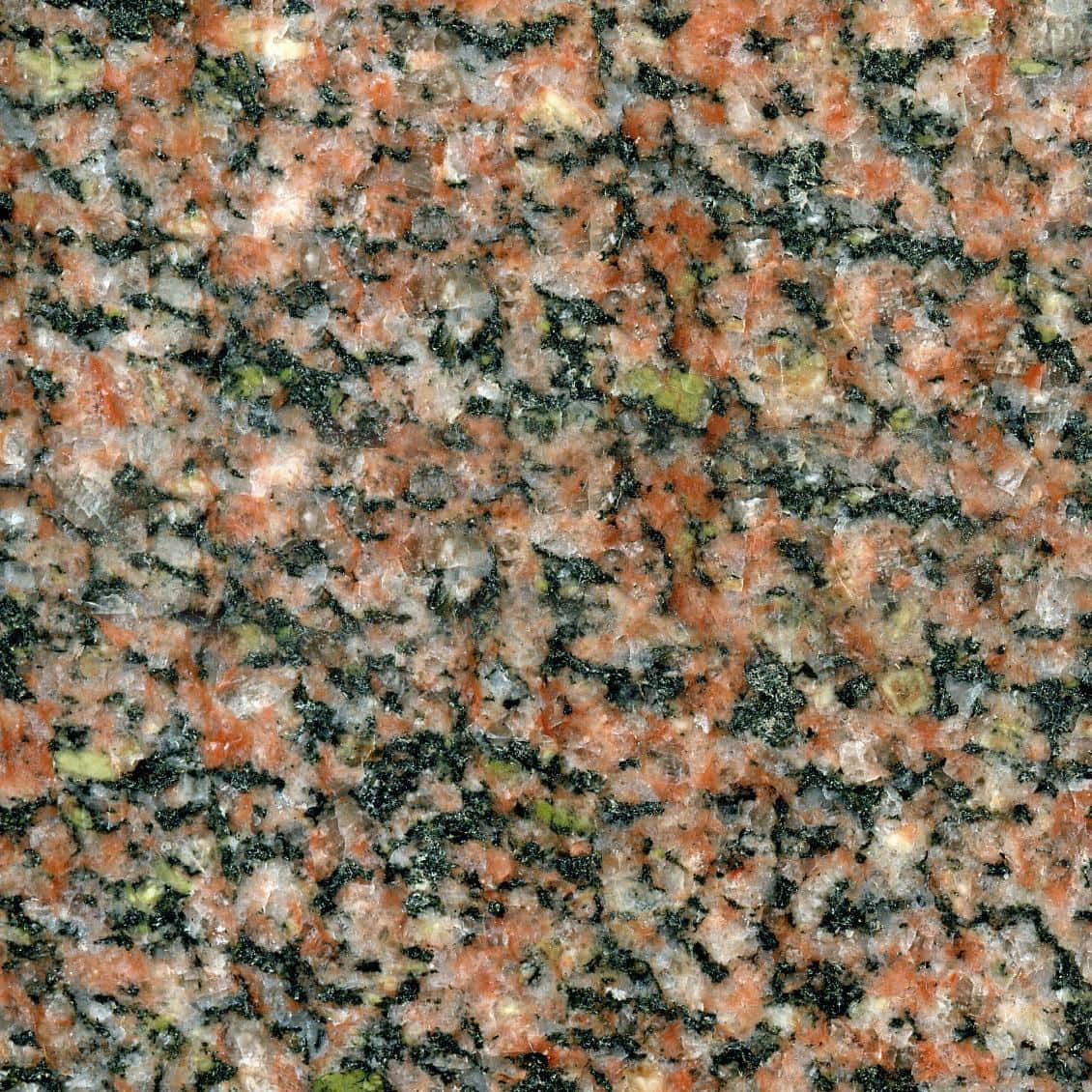Textured, multi-coloured granite rock