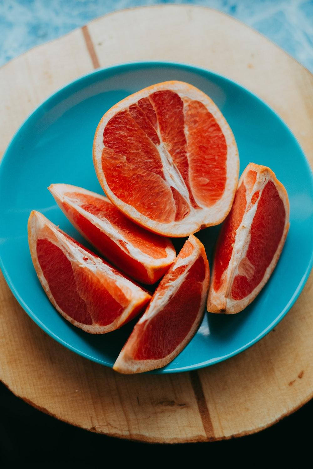 Grapefruit Slices High Angle Shot Wallpaper